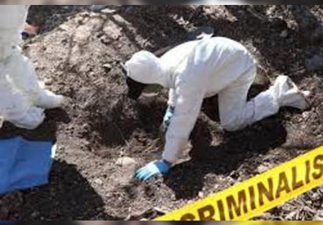 Hallan restos humanos en fosa cercana a puente fronterizo de Tamaulipas