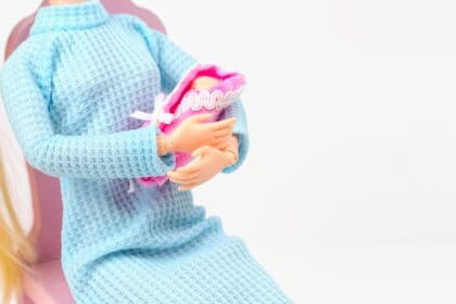 doll with a baby in her arms creative concept of 2023 11 27 04 53 17 utc