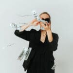 woman throwing money around lottery winner with b 2023 12 06 03 39 25 utc scaled e1705503103574