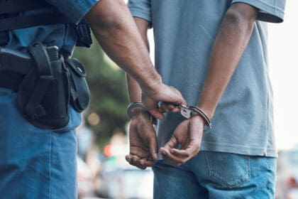 handcuffs police and hands of police man with cri 2023 11 27 05 27 29 utc