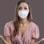 beautiful woman with face mask studio scaled e1722537988597